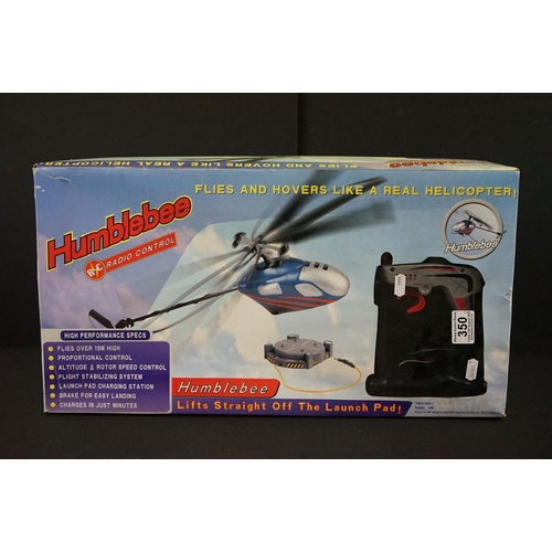 350 - 4 Boxed Radio control vehicles to include Humblebee Helicopter, Trucking Kids Scania Truck, Impact I... 