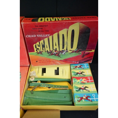 357 - Seven Boxed Chad Valley Escalado horse racing games with metal horses, together with 6 spare metal h... 