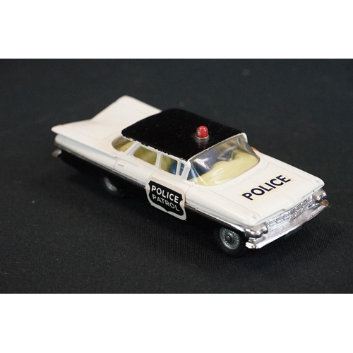 1239 - Boxed Corgi 481 Chevrolet Police Car (torn box end tab, diecast gd), together with a carded Corgi Cl... 