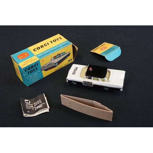 1239 - Boxed Corgi 481 Chevrolet Police Car (torn box end tab, diecast gd), together with a carded Corgi Cl... 