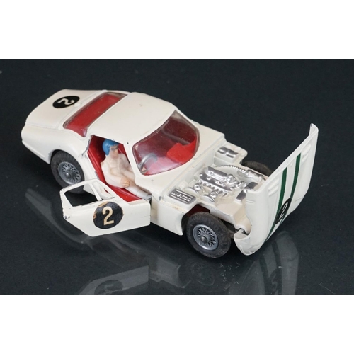 1019 - Three boxed Corgi diecast models to include 324 Marcos 1800 GT with Volvo engine in white, 312 E Typ... 