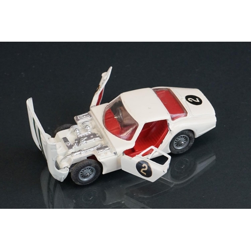 1019 - Three boxed Corgi diecast models to include 324 Marcos 1800 GT with Volvo engine in white, 312 E Typ... 