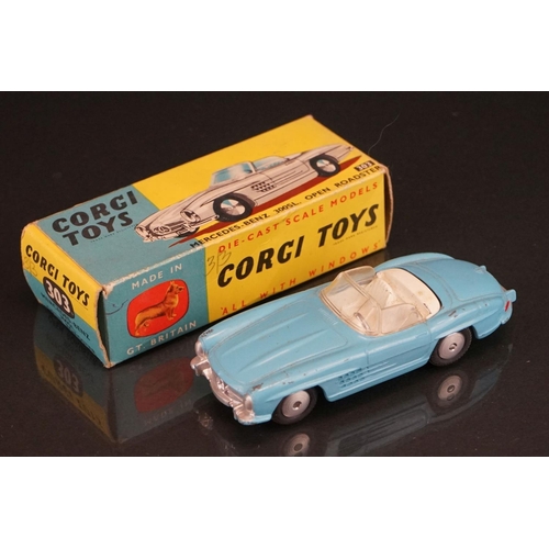 1025 - Three boxed Corgi diecast models to include 303 Mercedes Benz 300SL Open Roadster in sky blue, 309 A... 