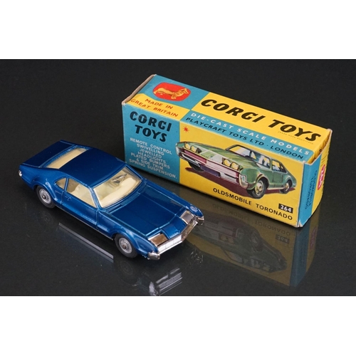 1033 - Two boxed Corgi diecast models to include 264 Oldsmobile Toronado in metallic blue and 245 Buick Riv... 