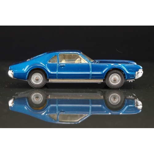 1033 - Two boxed Corgi diecast models to include 264 Oldsmobile Toronado in metallic blue and 245 Buick Riv... 