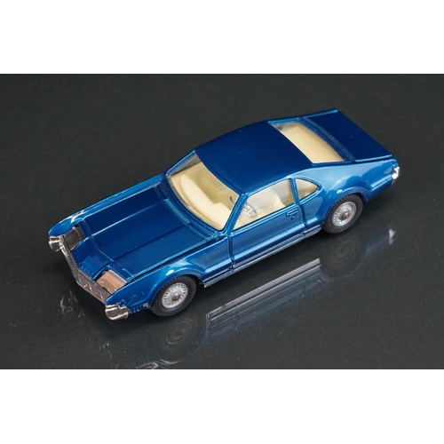 1033 - Two boxed Corgi diecast models to include 264 Oldsmobile Toronado in metallic blue and 245 Buick Riv... 