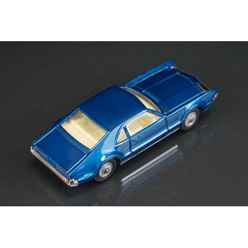 1033 - Two boxed Corgi diecast models to include 264 Oldsmobile Toronado in metallic blue and 245 Buick Riv... 