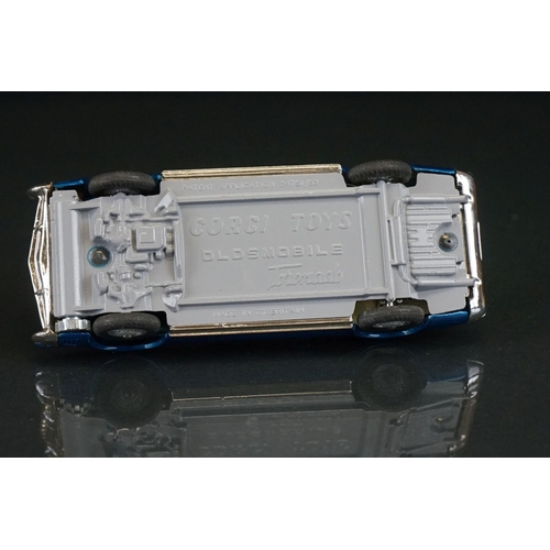 1033 - Two boxed Corgi diecast models to include 264 Oldsmobile Toronado in metallic blue and 245 Buick Riv... 