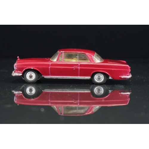 1035 - Three boxed Corgi diecast models to include 253 Mercedes Benz 220 SE Coupe in metallic maroon, 218 A... 