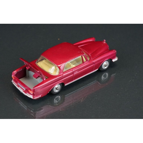 1035 - Three boxed Corgi diecast models to include 253 Mercedes Benz 220 SE Coupe in metallic maroon, 218 A... 