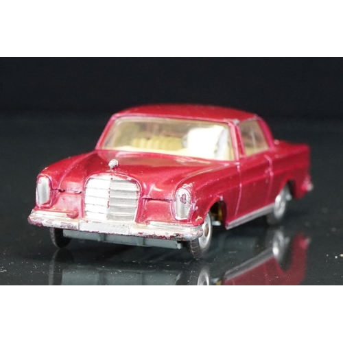 1035 - Three boxed Corgi diecast models to include 253 Mercedes Benz 220 SE Coupe in metallic maroon, 218 A... 