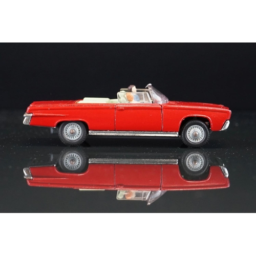 1036 - Boxed Corgi 246 Chrysler Imperial diecast model in red, green interior, with both figures and golf c... 