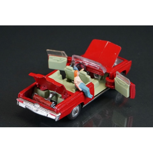 1036 - Boxed Corgi 246 Chrysler Imperial diecast model in red, green interior, with both figures and golf c... 