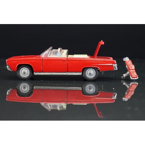 1036 - Boxed Corgi 246 Chrysler Imperial diecast model in red, green interior, with both figures and golf c... 