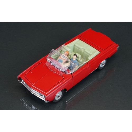 1036 - Boxed Corgi 246 Chrysler Imperial diecast model in red, green interior, with both figures and golf c... 