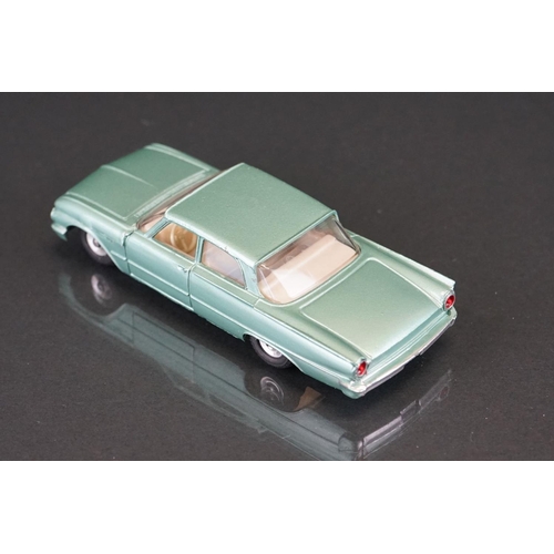 1041 - Boxed Dinky 148 Ford Fairlane diecast model in metallic green with off white interior, vg with fair-... 