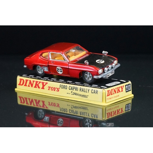 1063 - Three cased Dinky diecast models to include 213 Ford Capri Rally Car in metallic red (crack to case)... 