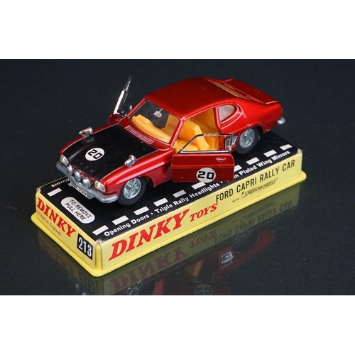 1063 - Three cased Dinky diecast models to include 213 Ford Capri Rally Car in metallic red (crack to case)... 