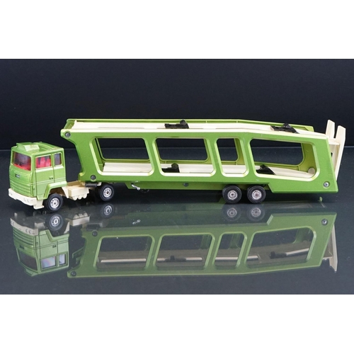 1064 - Two boxed Corgi diecast models to include Major 1144 Wrecker Truck and 1159 Car Transporter in metal... 