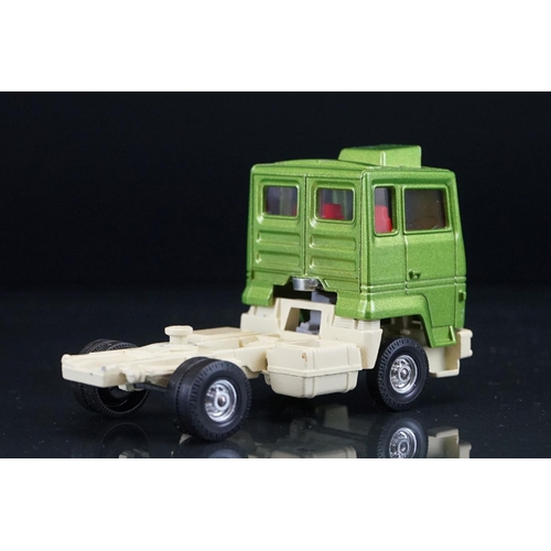 1064 - Two boxed Corgi diecast models to include Major 1144 Wrecker Truck and 1159 Car Transporter in metal... 