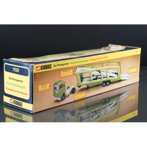 1064 - Two boxed Corgi diecast models to include Major 1144 Wrecker Truck and 1159 Car Transporter in metal... 