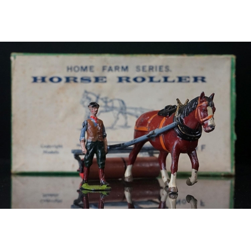 1067 - Four boxed Britains Home Farm Series metal models to include No 8F Horse Rake, No 20F Farmers Gig, N... 