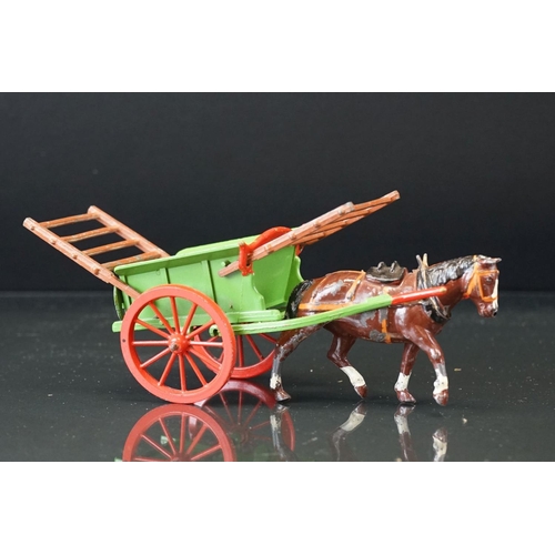 1067 - Four boxed Britains Home Farm Series metal models to include No 8F Horse Rake, No 20F Farmers Gig, N... 