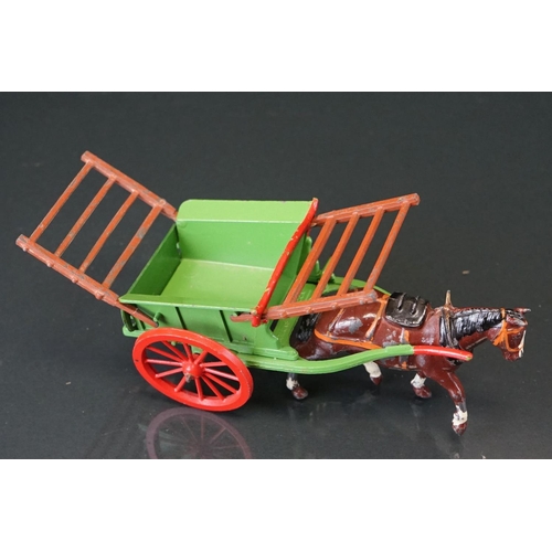 1067 - Four boxed Britains Home Farm Series metal models to include No 8F Horse Rake, No 20F Farmers Gig, N... 