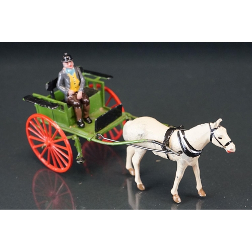 1067 - Four boxed Britains Home Farm Series metal models to include No 8F Horse Rake, No 20F Farmers Gig, N... 