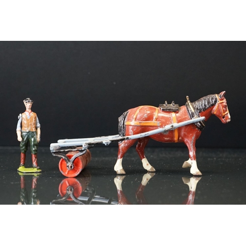 1067 - Four boxed Britains Home Farm Series metal models to include No 8F Horse Rake, No 20F Farmers Gig, N... 