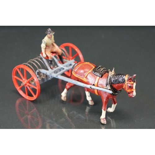 1067 - Four boxed Britains Home Farm Series metal models to include No 8F Horse Rake, No 20F Farmers Gig, N... 