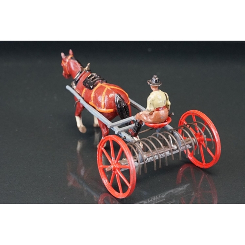 1067 - Four boxed Britains Home Farm Series metal models to include No 8F Horse Rake, No 20F Farmers Gig, N... 