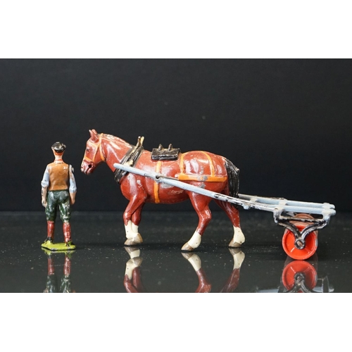 1067 - Four boxed Britains Home Farm Series metal models to include No 8F Horse Rake, No 20F Farmers Gig, N... 