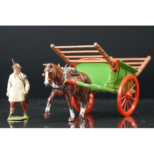 1067 - Four boxed Britains Home Farm Series metal models to include No 8F Horse Rake, No 20F Farmers Gig, N... 