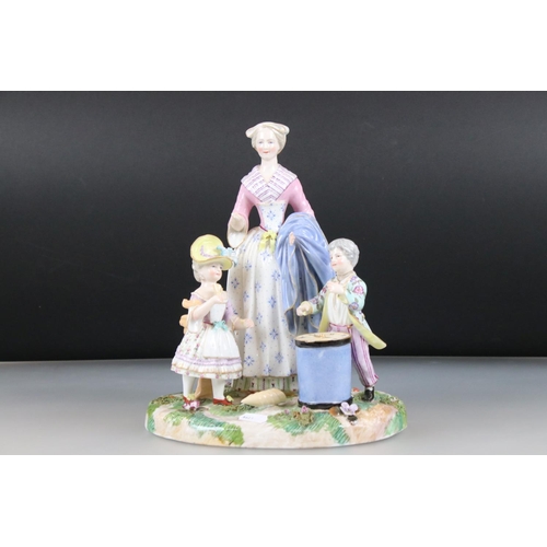 1 - Meissen Figure Group of a Mother and two Children, underglazed blue cross swords marks to base, 27cm... 