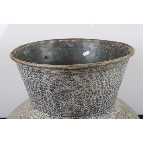 107 - Middle Eastern Large Copper Pot, hand beaten and scratch engraved with Islamic script and patterns, ... 