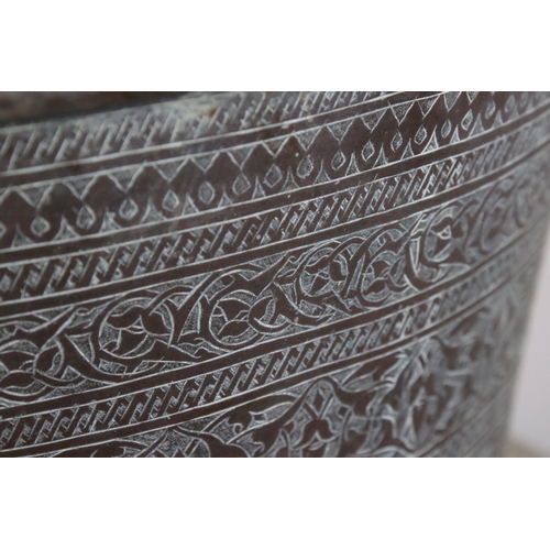 107 - Middle Eastern Large Copper Pot, hand beaten and scratch engraved with Islamic script and patterns, ... 