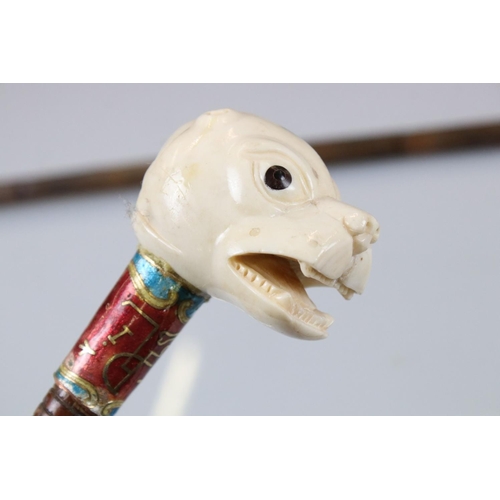 121 - Silver Tip Walking Stick together with a Resin Handled Walking Stick in the form of a Dog