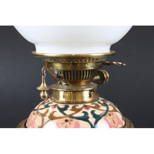 122 - Zolnay Pecs pink floral patterned Ceramic Oil Lamp with drop-in font and brass base, Messengers burn... 