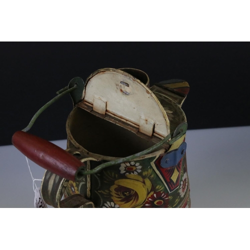 128 - A bargeware kettle and bowl with handprinted floral decoration.