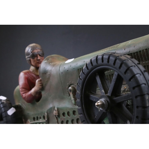 139 - A large resin model of a early 20th century racing car.