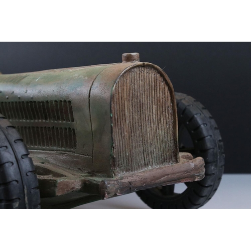 139 - A large resin model of a early 20th century racing car.