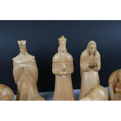 143 - Eleven Hand Carved Sycamore Nativity Figures and Animals, tallest 28cm together with one other piece