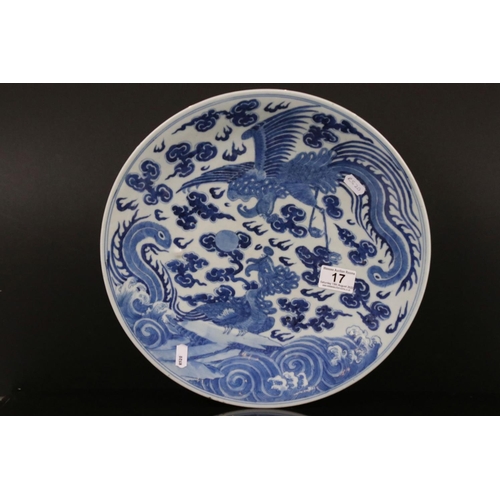 17 - Chinese Blue and White Charger decorated with Dragon and Mythical Birds chasing a pearl amongst clou... 