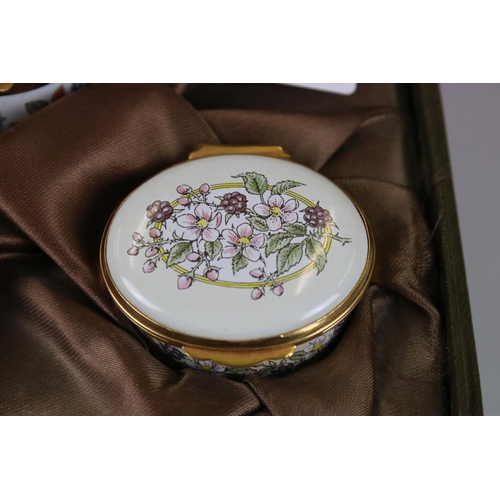 176 - A cased set of three English enamel on copper pill boxes by Crummles in fitted display box.