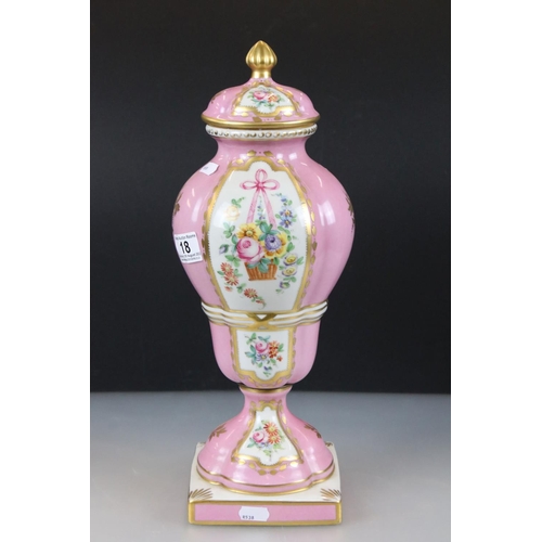 18 - 19th century Continental Porcelain Pink Ground Lidded Urn decorated with panels of flowers in a bask... 