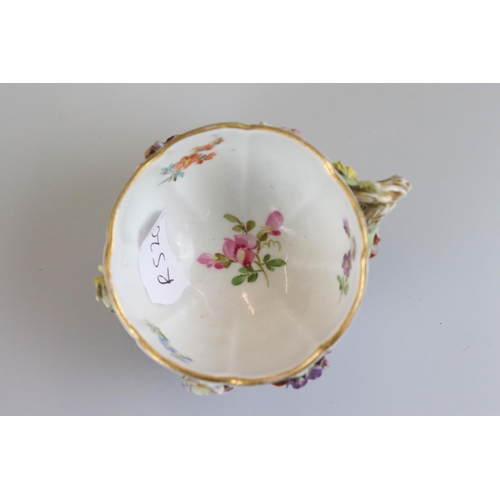 28 - Meissen Porcelain Cabinet Cup and Saucer, floral encrusted and painted with flowers, blue cross swor... 