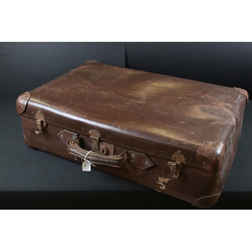 337 - Two vintage brown leather suitcases together with a hat box.