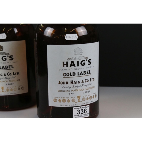 338 - A pair of Haig Whisky gold label shop display bottles, approx 40cm in height.