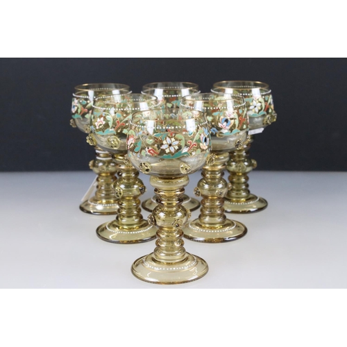 42 - Set of six Bohemian green ground hock glasses with enamelled floral decoration and roundels